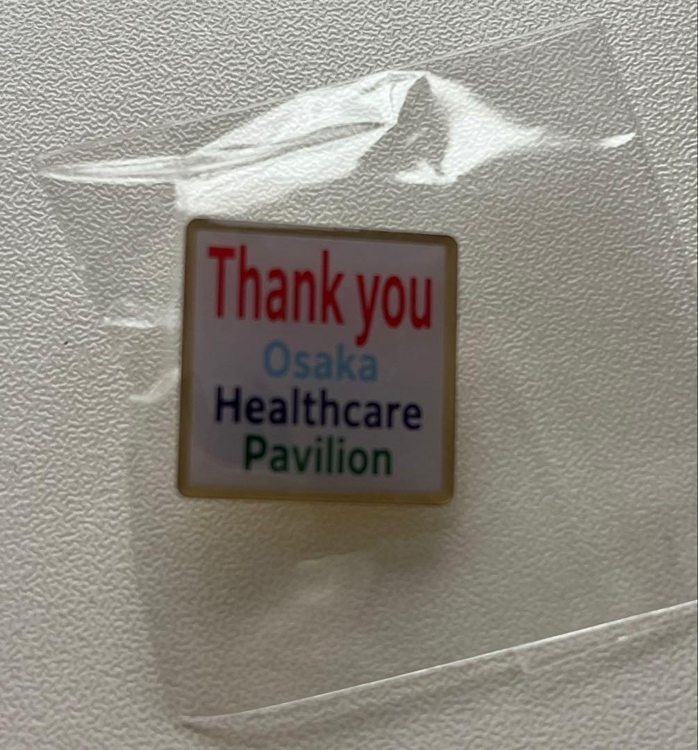 大阪Healthcareパビリオンピン金色ピンバッジ 大阪ヘルスケア 万博