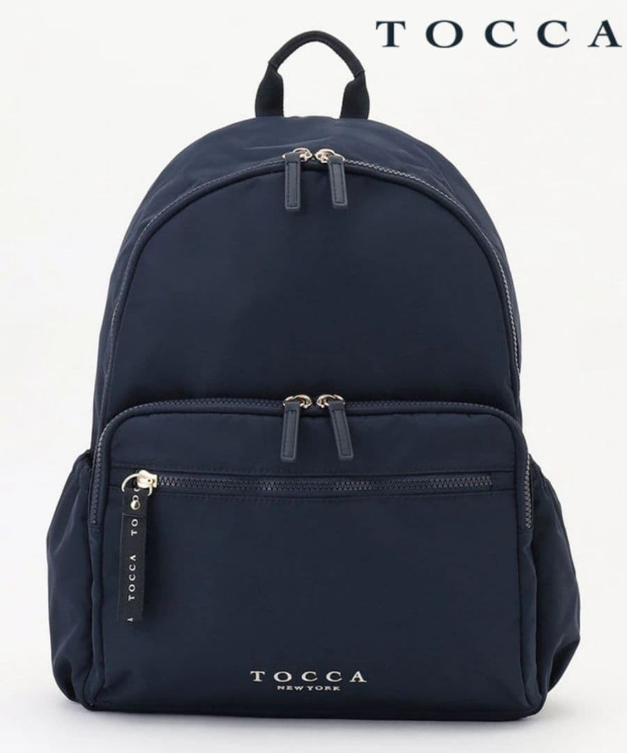 【新品タグ付き】トッカ CAROVANAバックパック/リュックサック ネイビー系 新品タグ付き】トッカ CAROVANAバックパック/リュックサック ネイビー