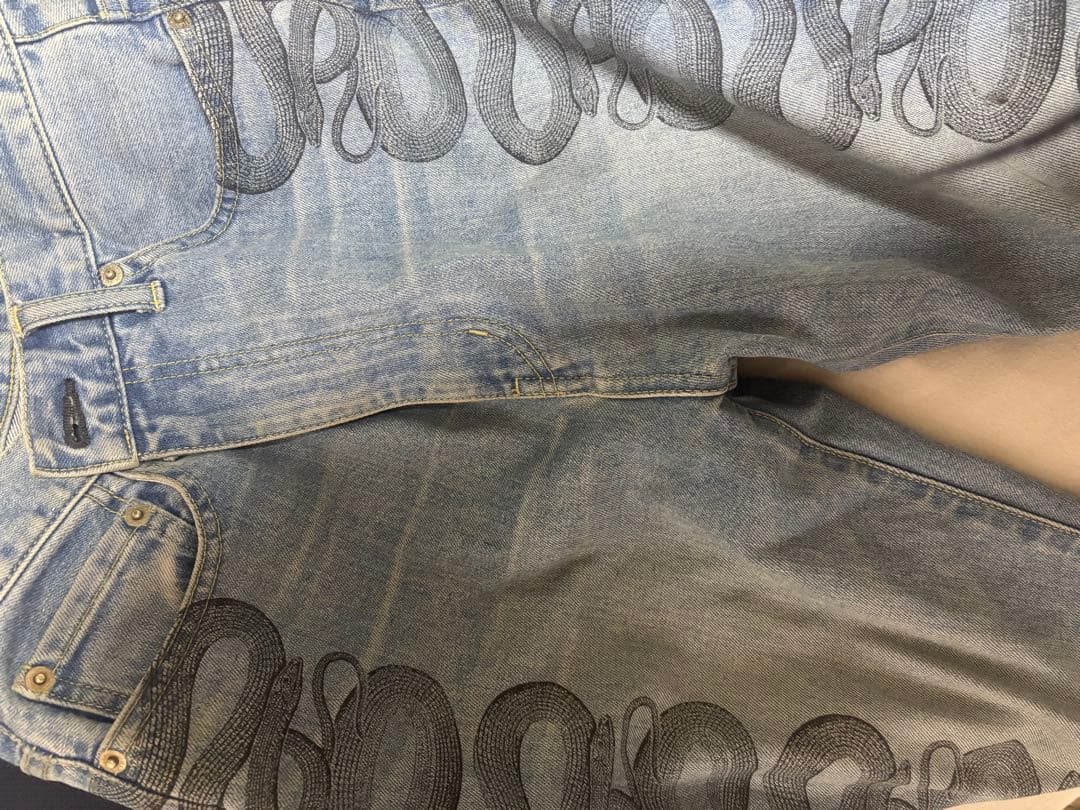 snake loop フレアデニムパンツ