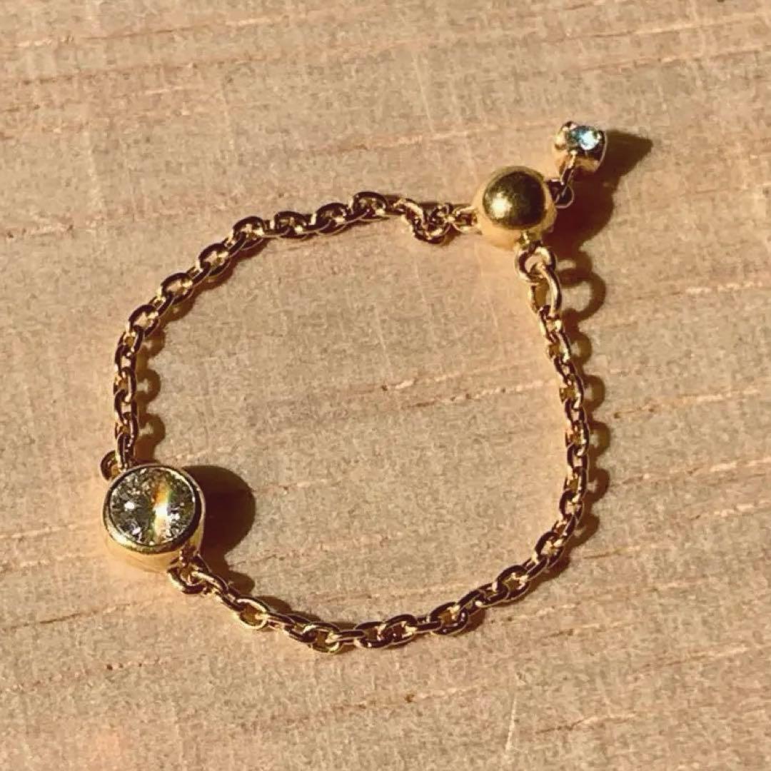 【1月末までの限定価格】新品同様 K18オレフィーチェヌードチェーンリング K18/Pt「マンダリンガーネット バース ヌード」チェーンリング ー