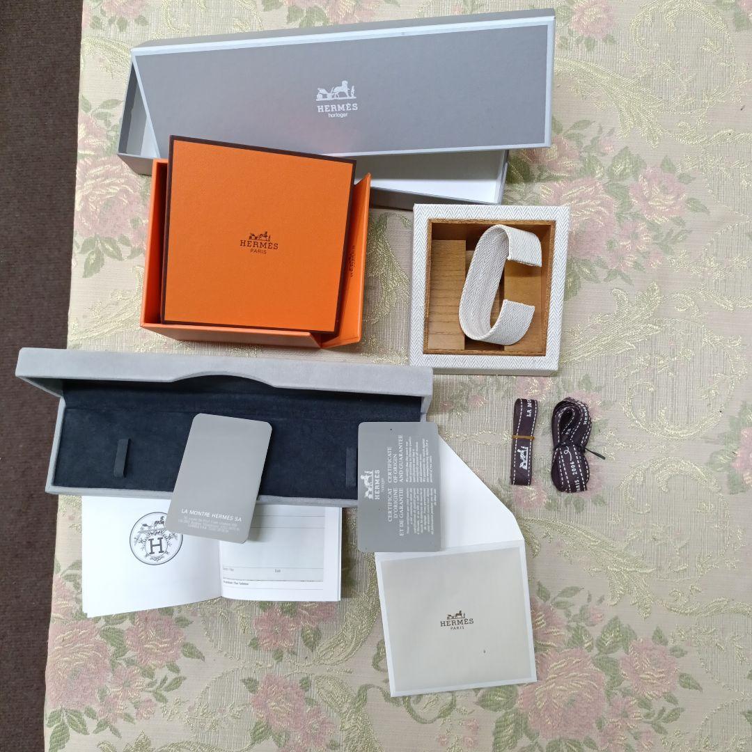 HERMES 時計オレンジ と ブレスレットケース