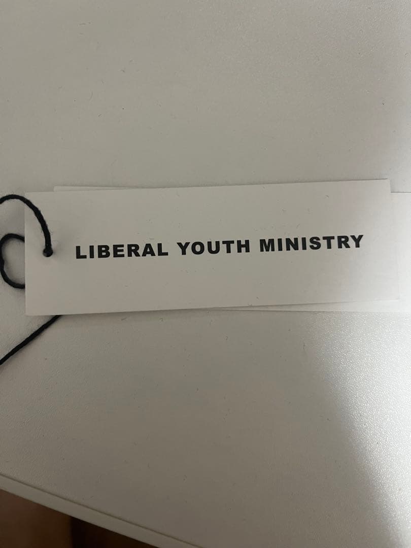 トップス LIBERAL YOUTH MINISTAY