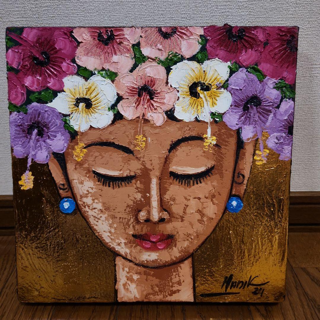 Manik 女性の肖像画