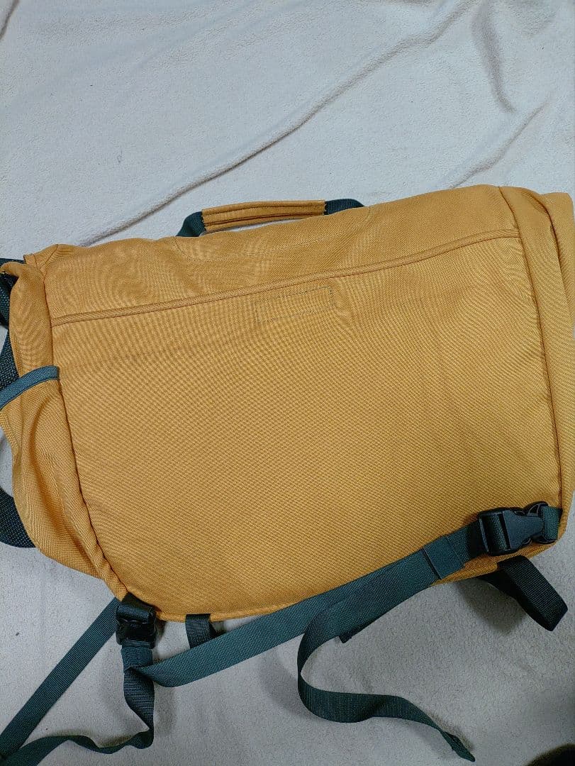 patagonia ハーフマスメッセンジャーバッグ マンゴー - メルカリ
