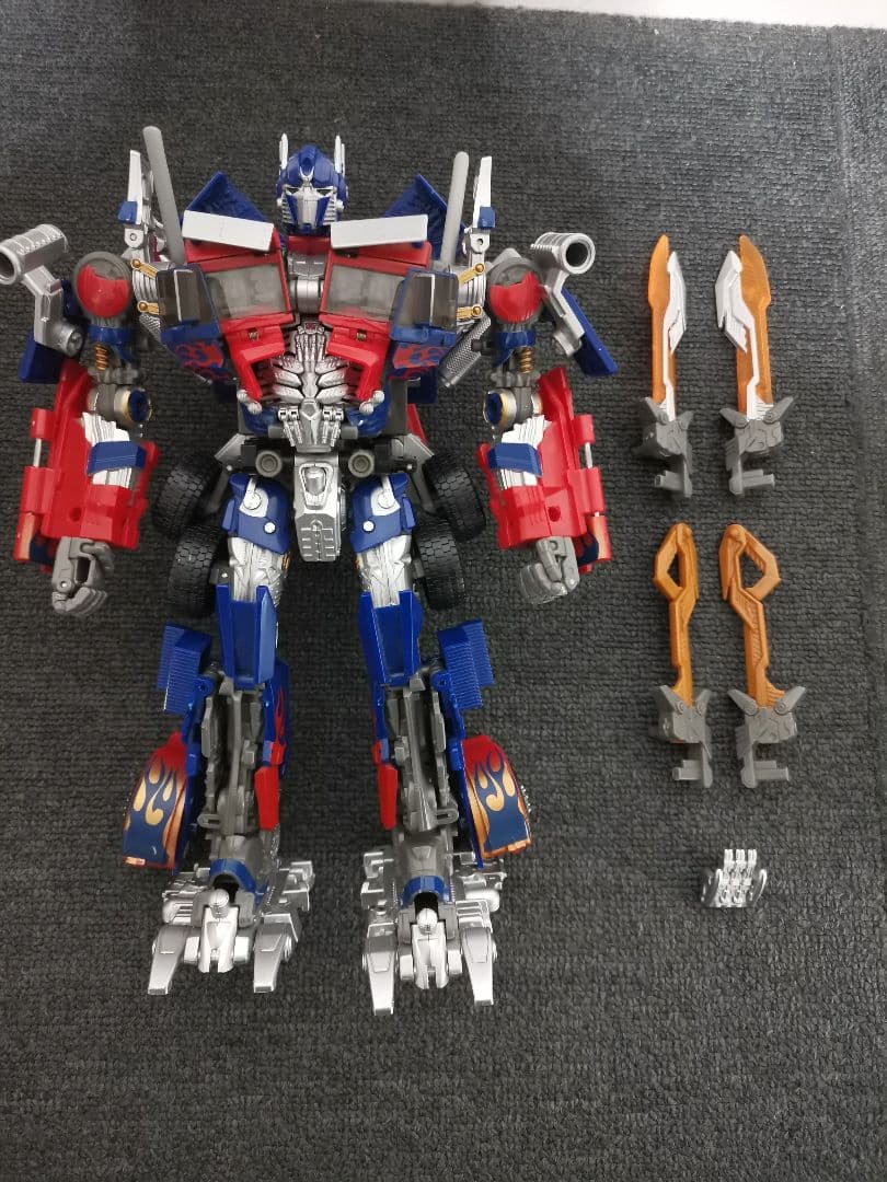 トランスフォーマー　オプティマスプライム　MB-11 10th アニバーサリー Amazon.co.jp: トランスフォーマー MB-11 ムービー10thアニバーサリー
