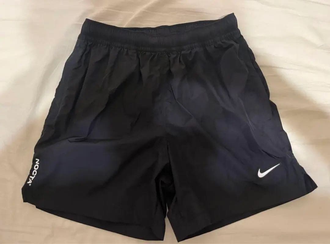 Nike × noctaコラボ ナイロンショートパンツ - メルカリ