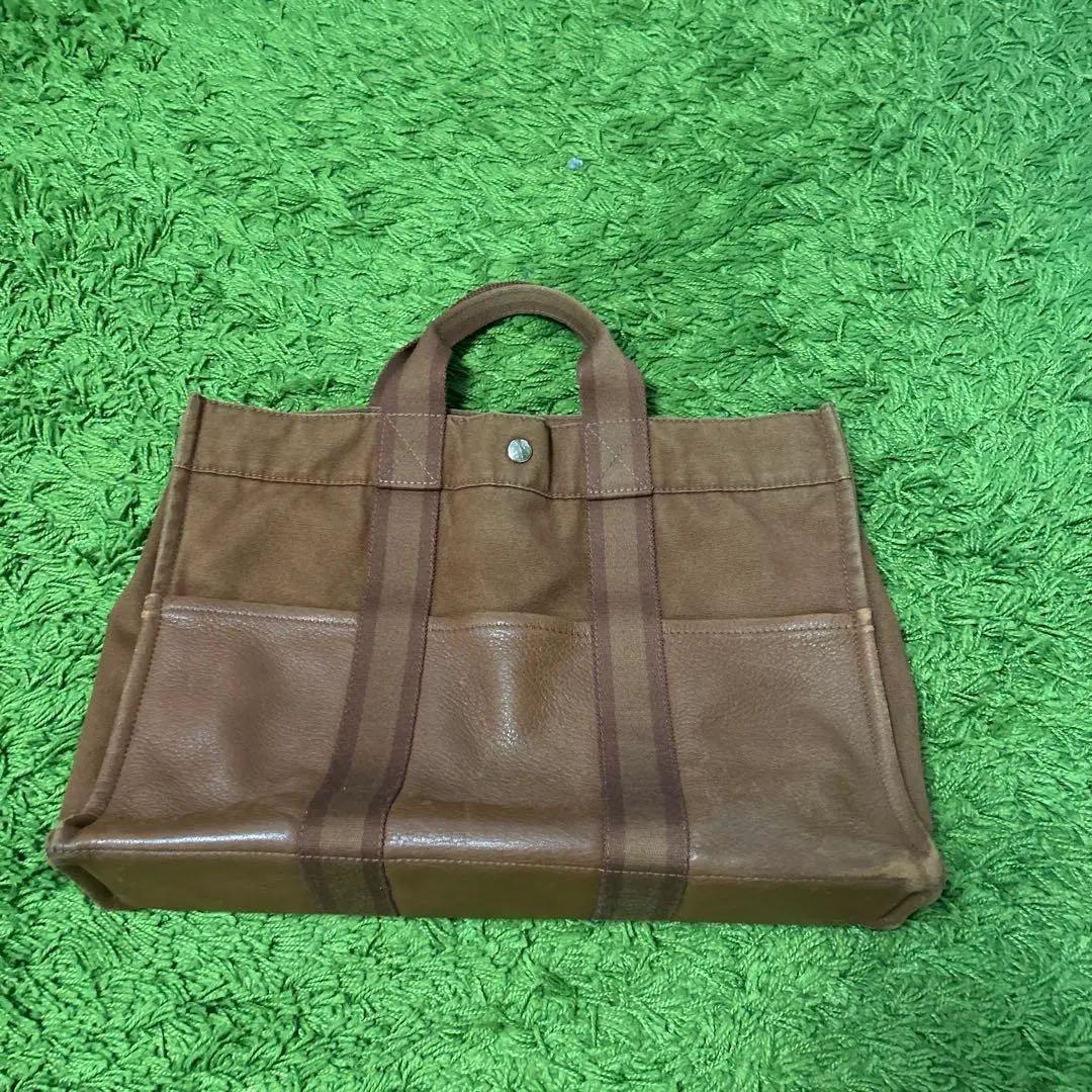 エルメスのブラウンレザーストライプトートバッグ