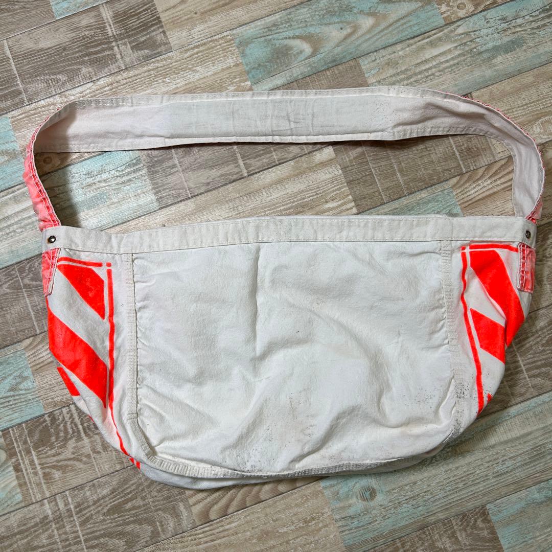 レア PLAIN DEALER ニュースペーパーバッグ オレンジ - メルカリ