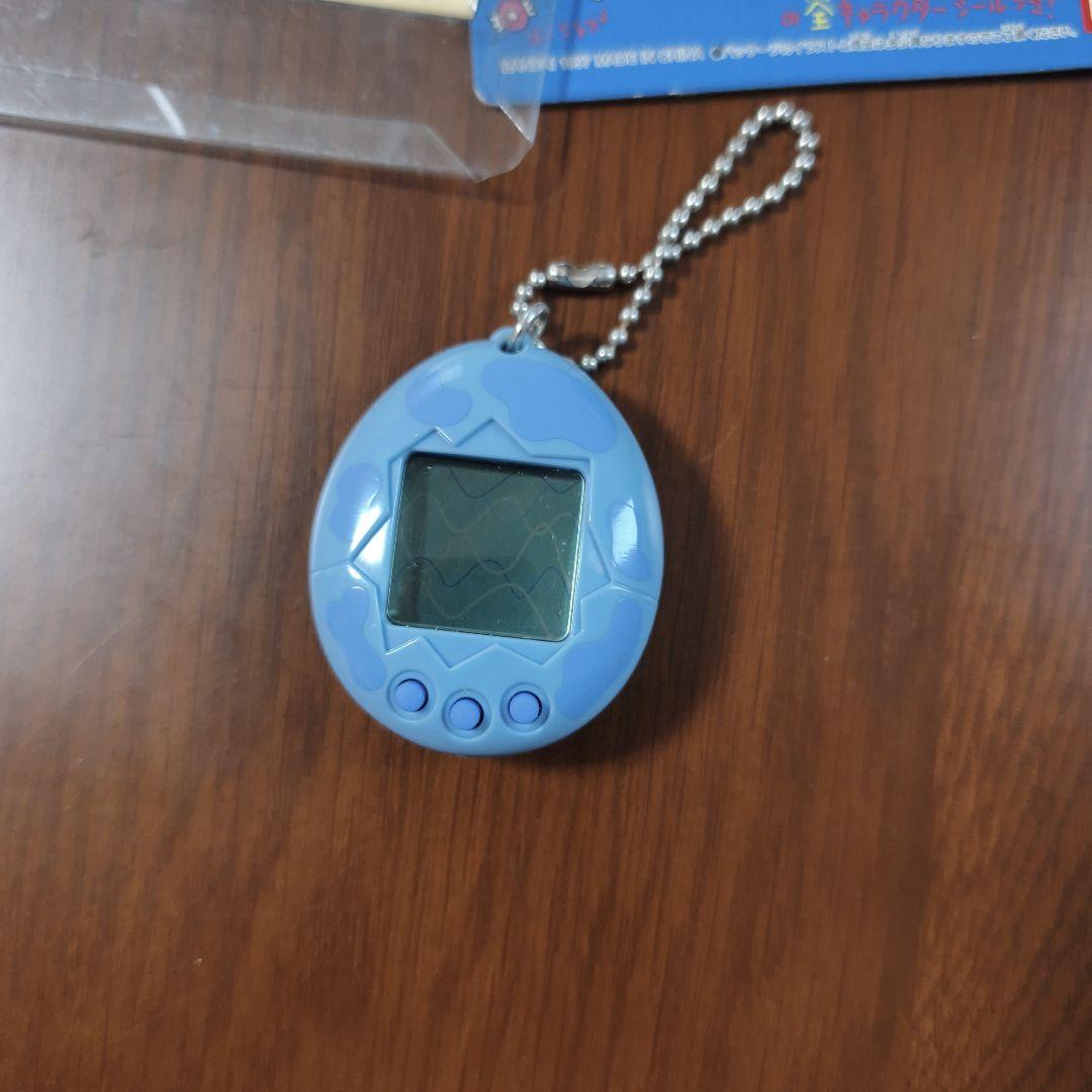 BANDAI たまごっち 青 1997年製 シール付き※動作未確認 - メルカリ