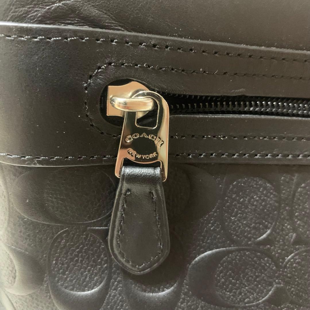 コーチ F72220 メッセンジャーバック エンボス シグネチャー レザー 黒