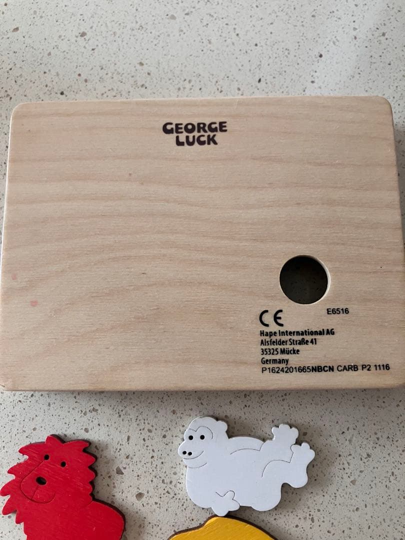 ジョージラック カラフル動物の木製パズル - メルカリ