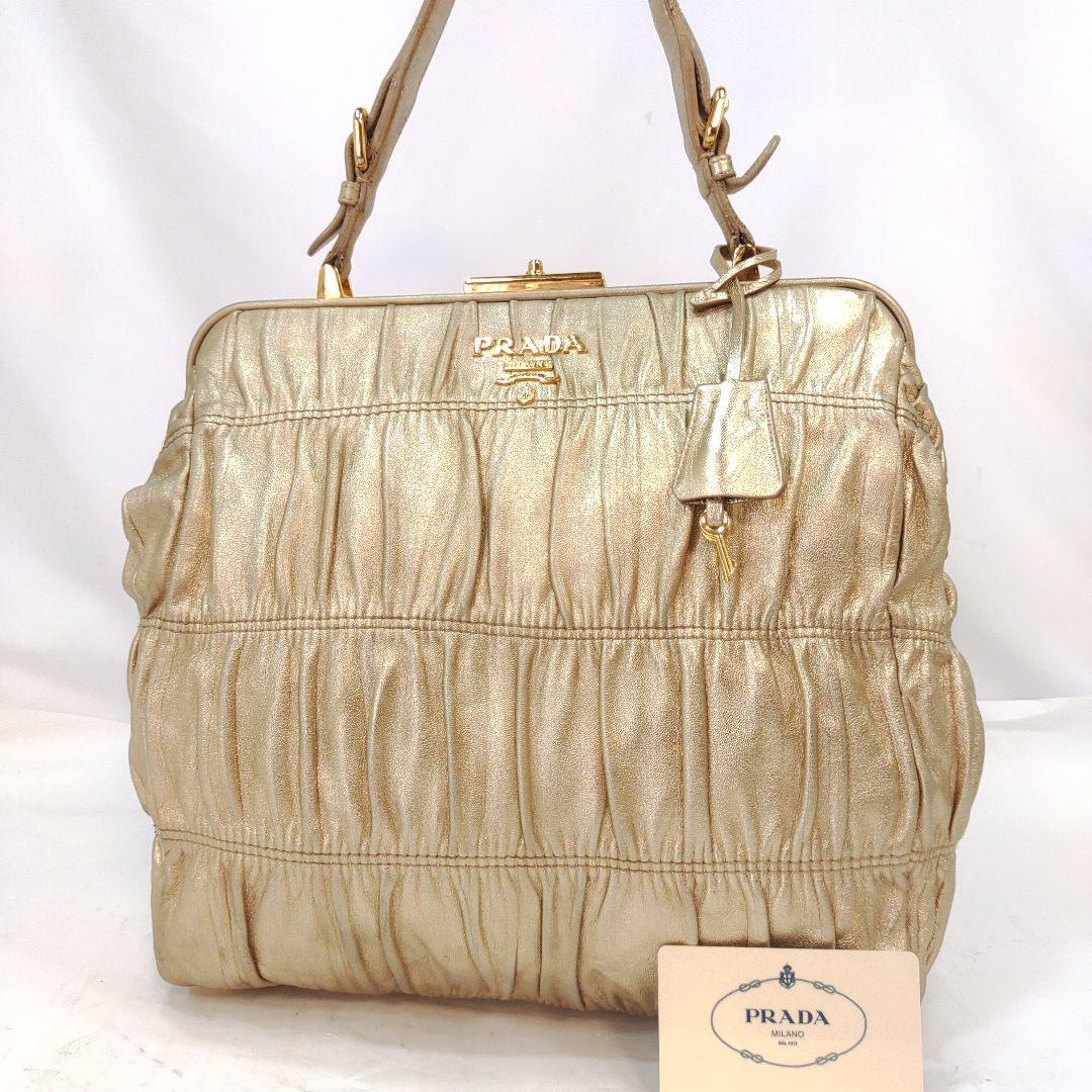 【美品】プラダ ハンドバッグ がま口 ギャザー レザー ギャラ付 ゴールド