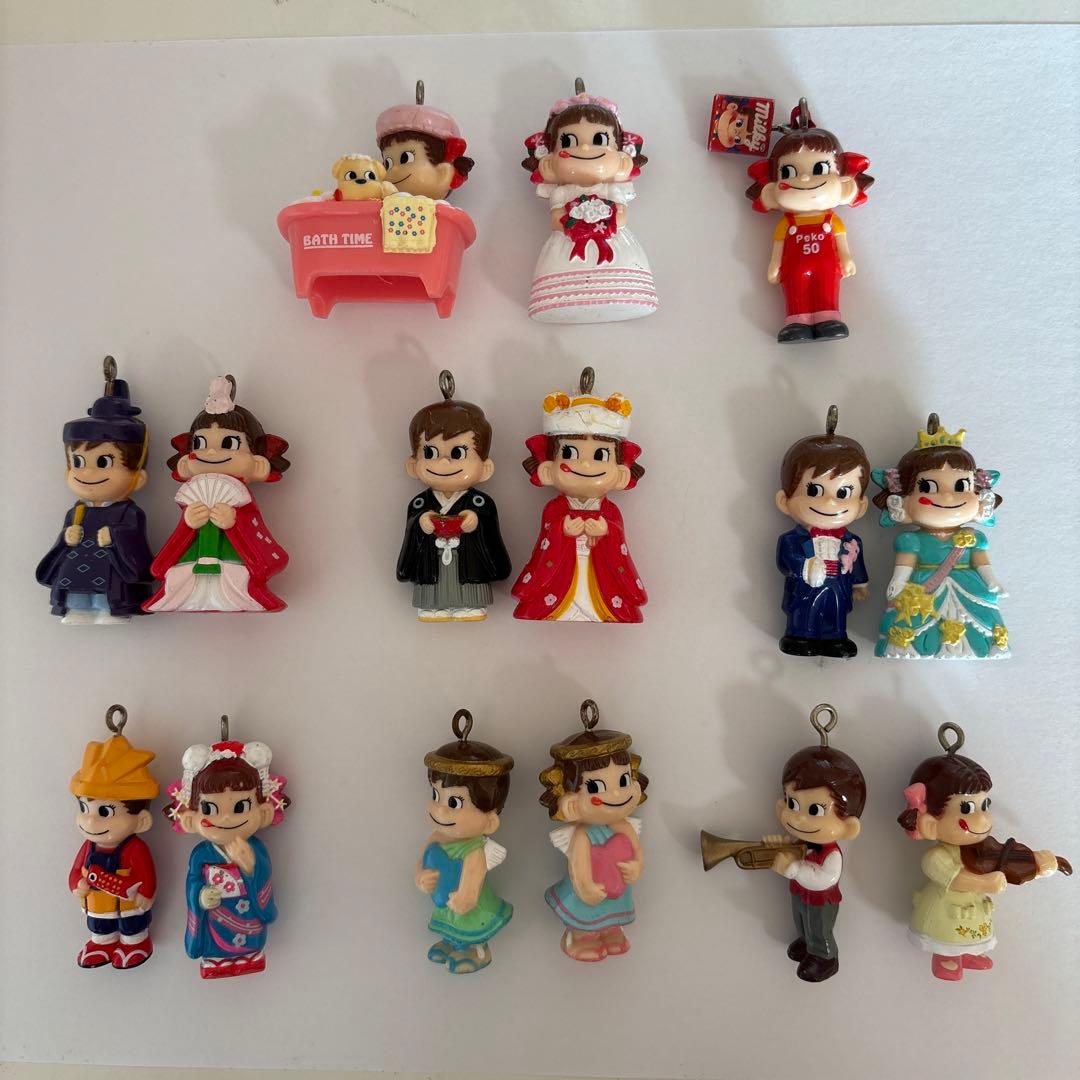 ペコちゃん、ポコちゃん人形.ストラップ - メルカリ