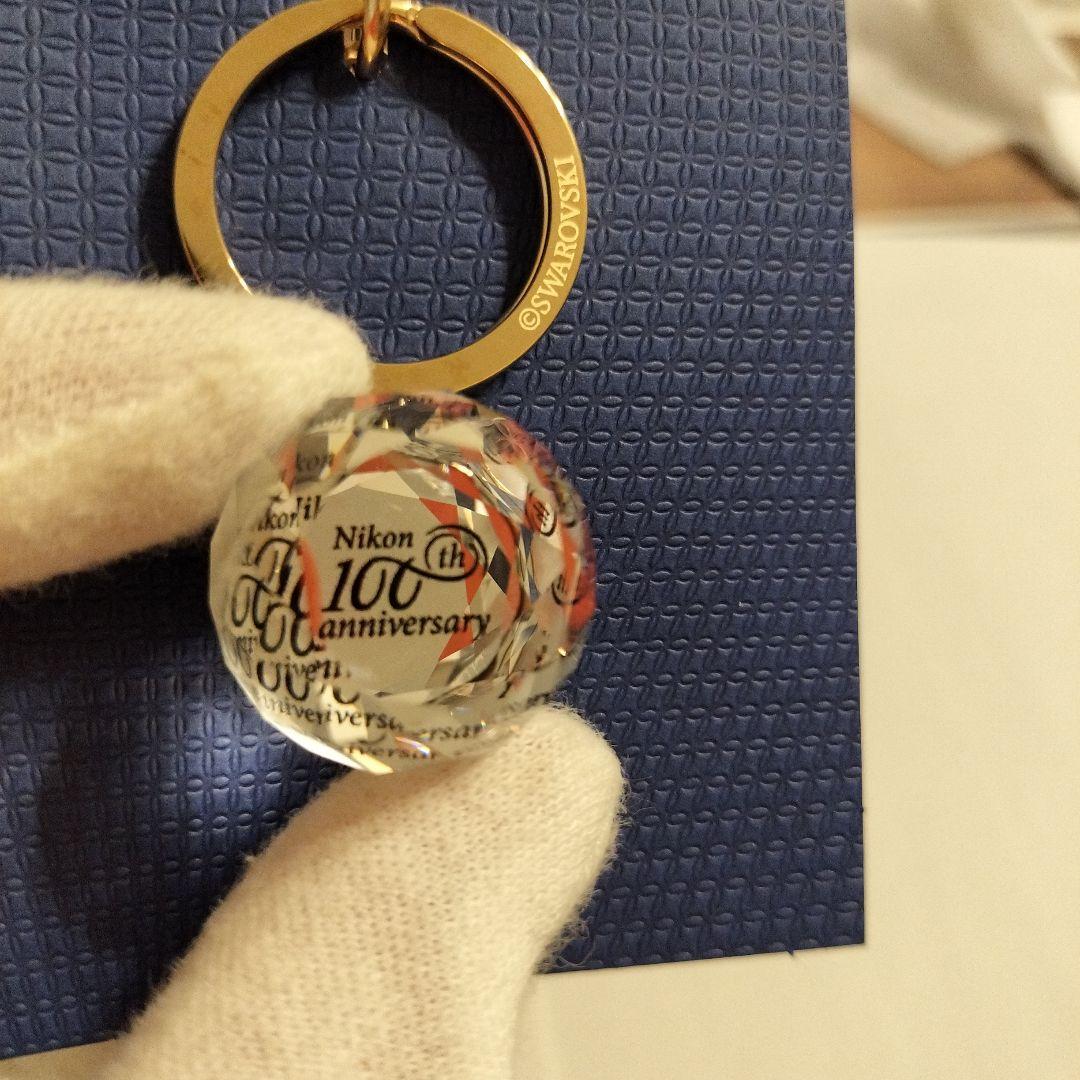 Nikon 100周年記念 スワロフスキー キーホルダー SWAROVSKI - メルカリ