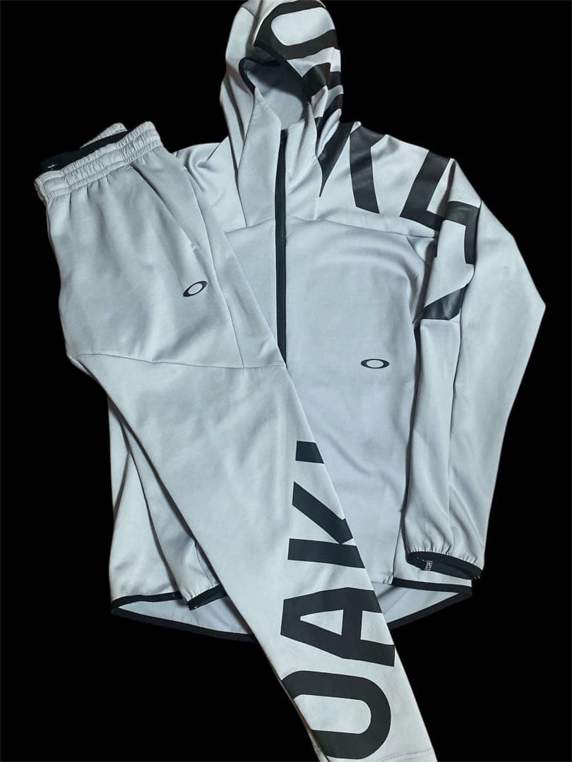 Oakley ナイロンジャケット・セットアップ グレー OAKLEY（オークリー） スウェット 上下 メンズ セットアップ ブランド