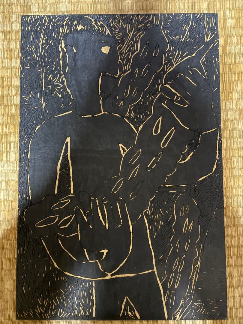 ヘチマを穫る少年