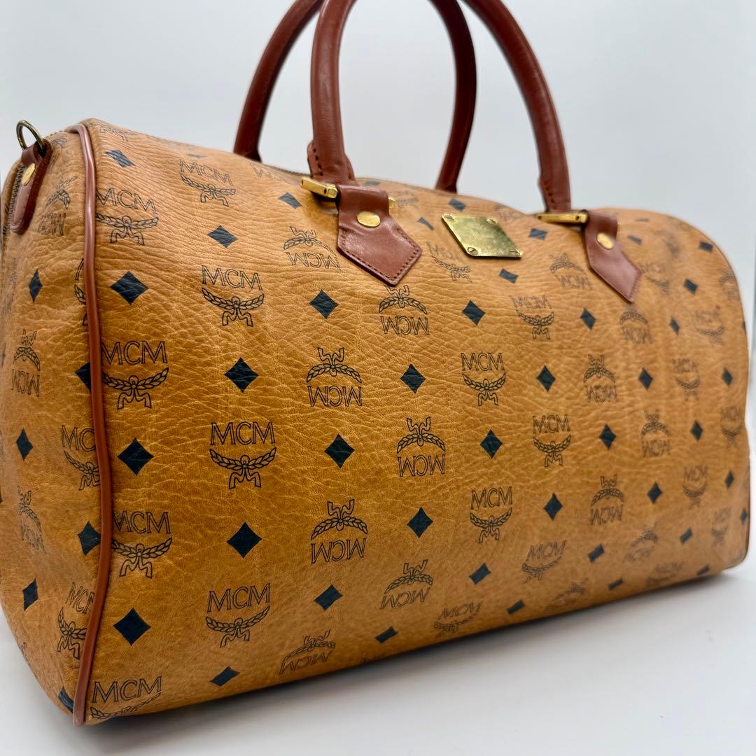 MCM ボストンバッグ ヴィセトス 総柄 ハンドバッグ キャメル PVC×本革 MCM ボストンバッグ ヴィセトス 総柄 ハンドバッグ キャメル PVC×本革