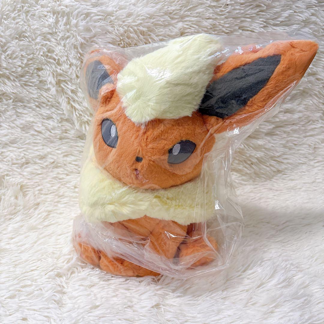 ふわふわ抱きぬいぐるみ ブースター ポケモンセンター - メルカリ