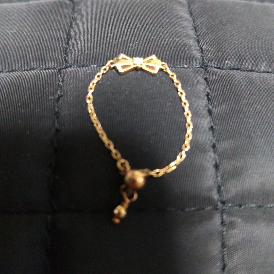 NOJESS ミル打ちダイヤリボンチェーンリング