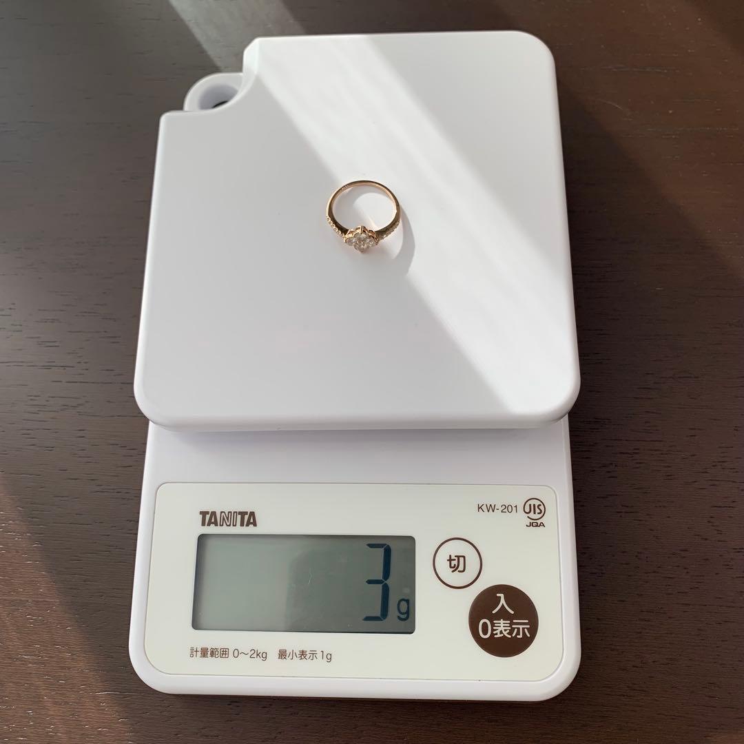 鑑別書付 K18PG 0.71ct四つ葉クローバーミル打ち天然ダイヤモンド