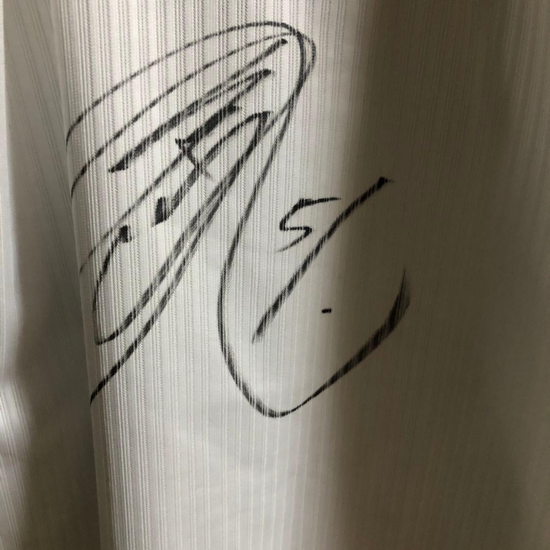 鈴木誠也直筆サインユニフォーム - メルカリ