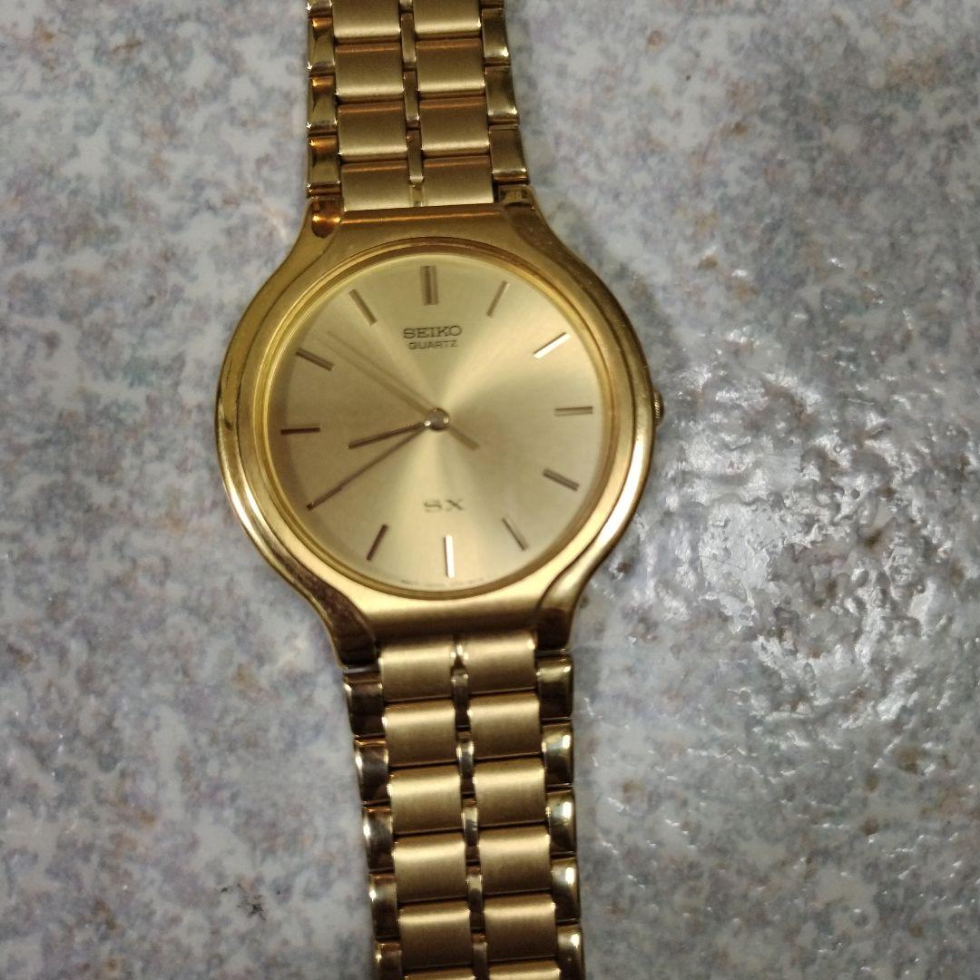 SEIKO ゴールド アナログ時計 SXクオーツ - メルカリ