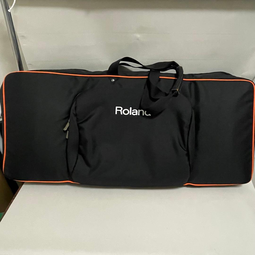 動作品Roland 37鍵 ショルキー Lucina AX-09 シンセサイザー ショルダーシンセサイザー Lucina AX-09 パールホワイト｜トレファクONLINE