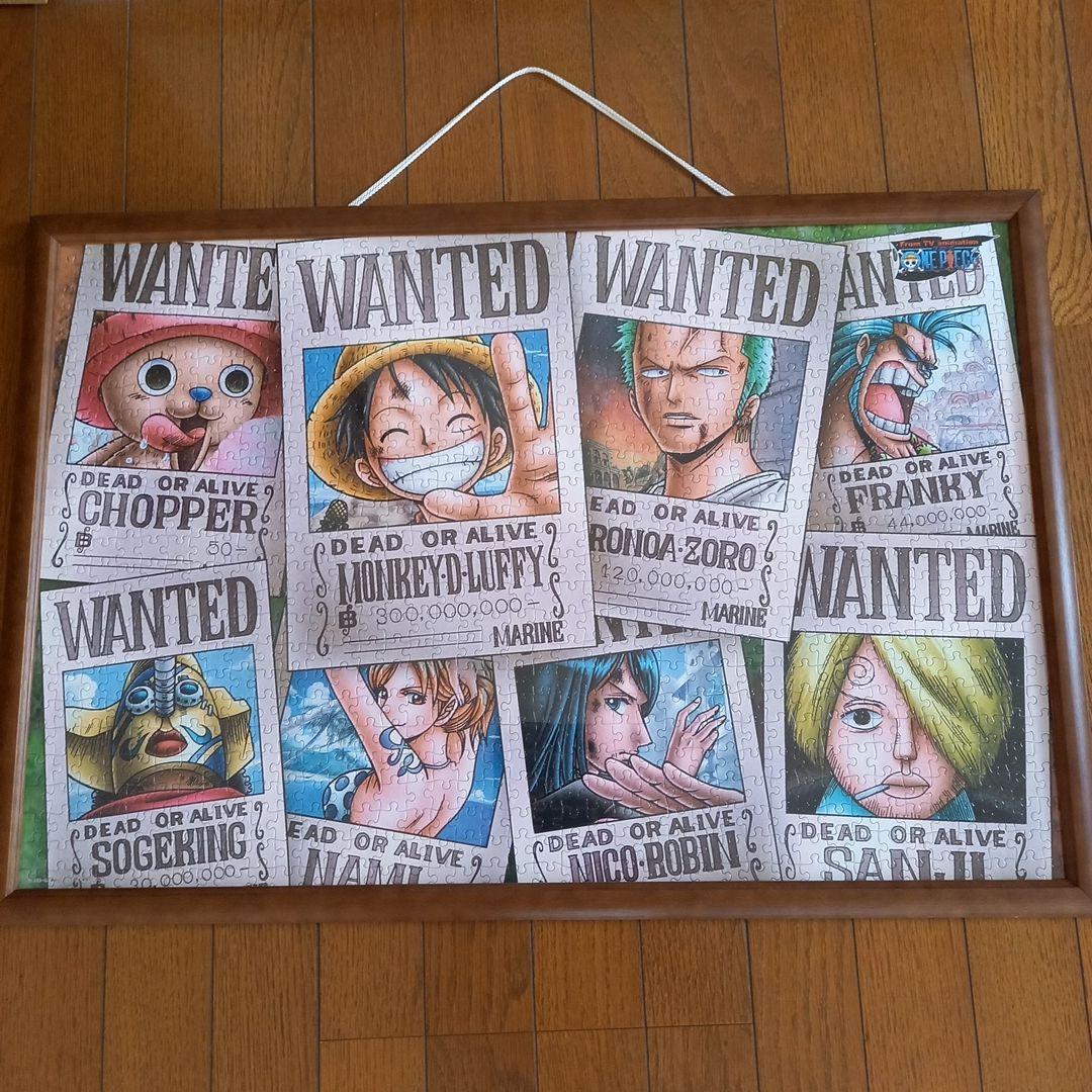 ワンピース 1000ピース パズル 『新たな手配書』完成品 額付き - メルカリ