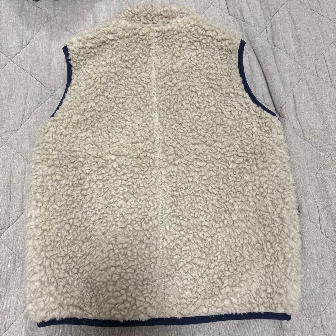 patagonia フリースベスト クリーム/ネイビー - メルカリ