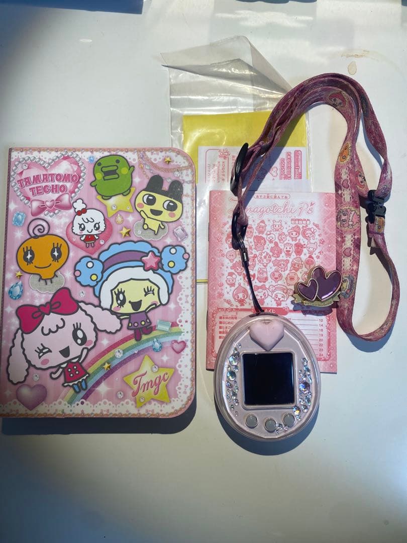 たまごっちピース たまとも手帳 - メルカリ