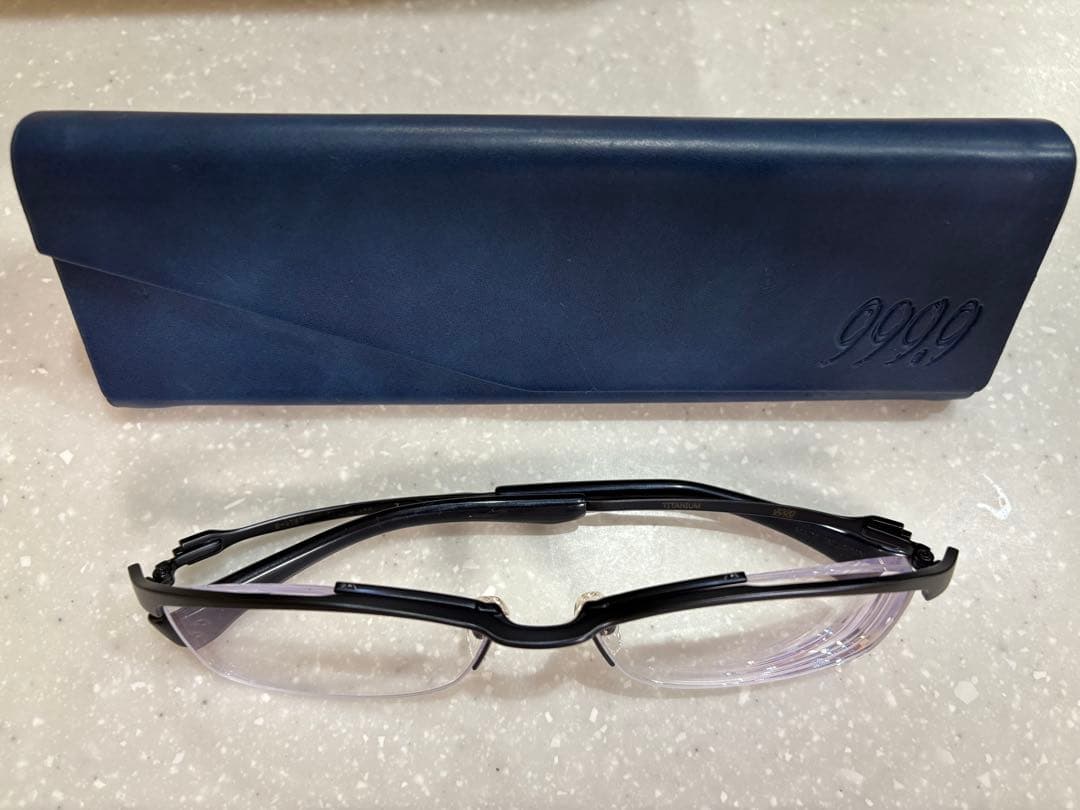 999.9 ダークブルーマットフレーム メガネ(度あり) ケース付き