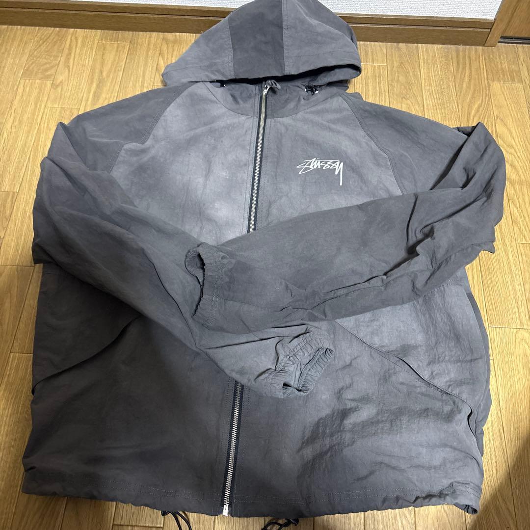 Stussy グレー フード付きナイロンジャケット - メルカリ