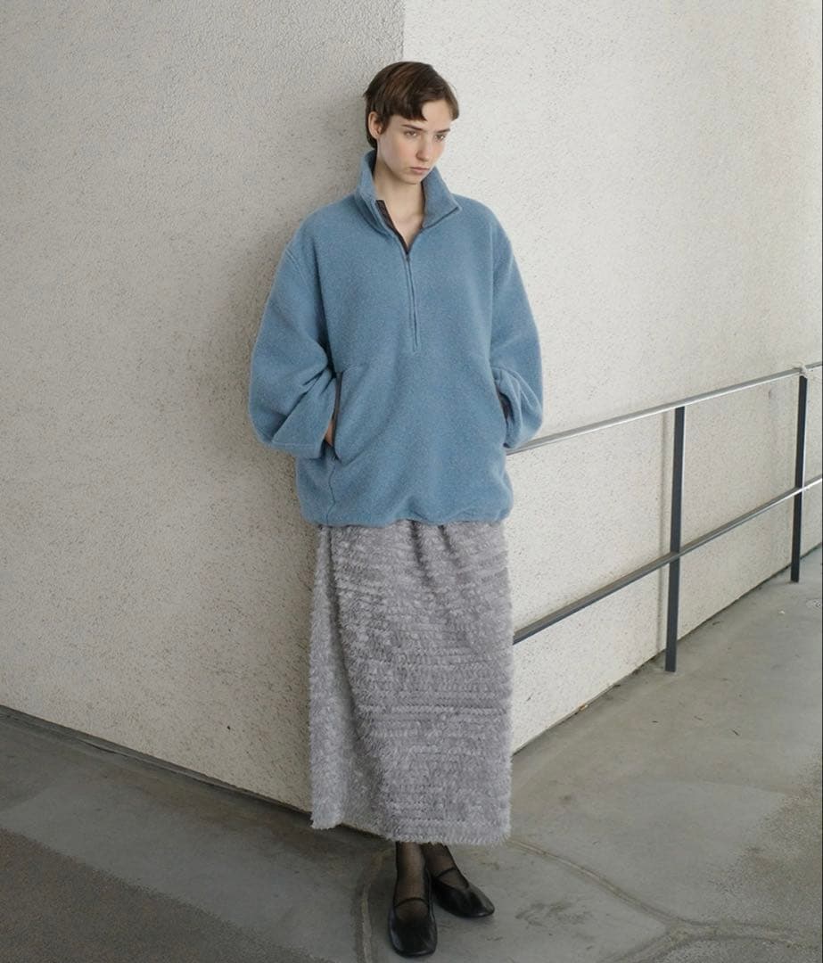 clane スライバーハーフジップトップス