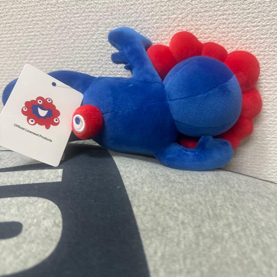 大阪万博 ミャクミャク寝そべりぬいぐるみ - メルカリ