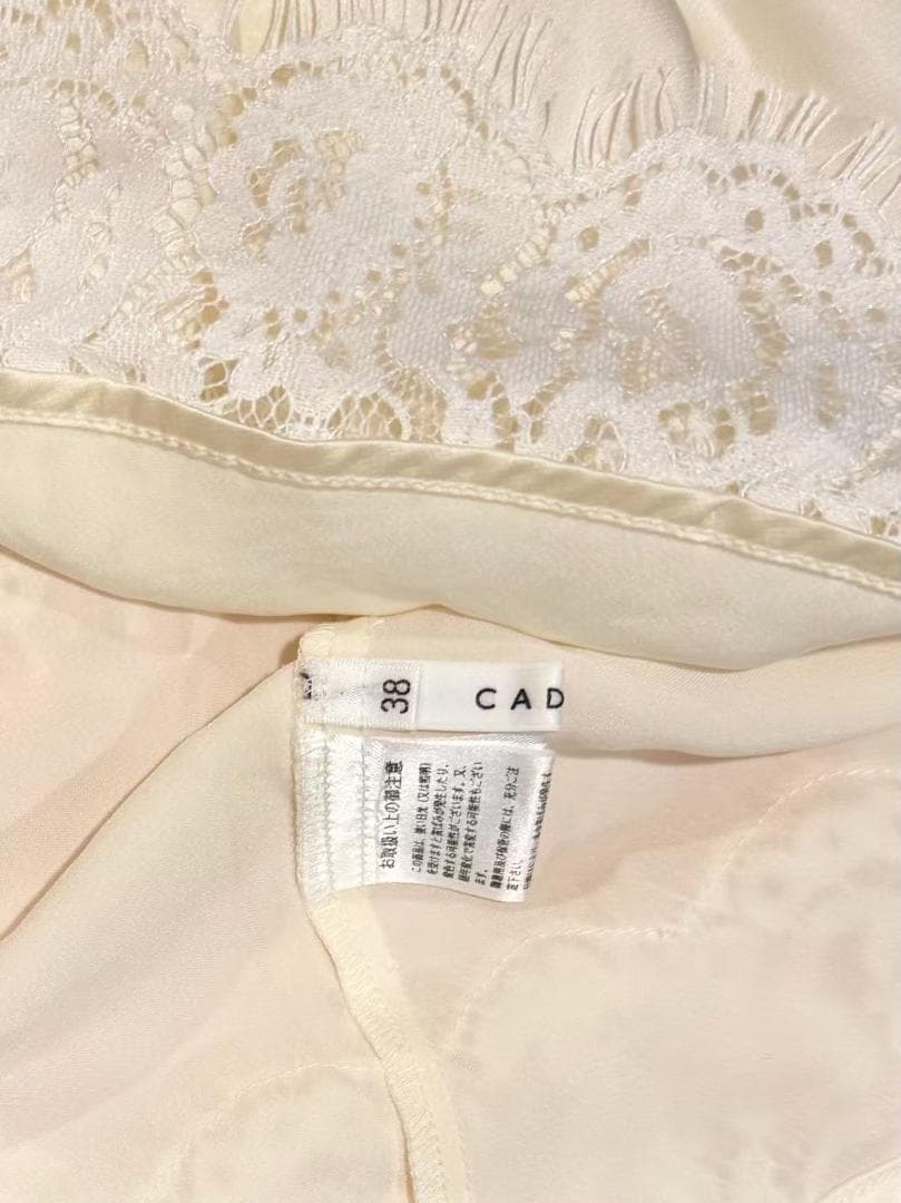 最新作 完売色 新品 CADUNE レースキャミブラウス オフ白 - メルカリ