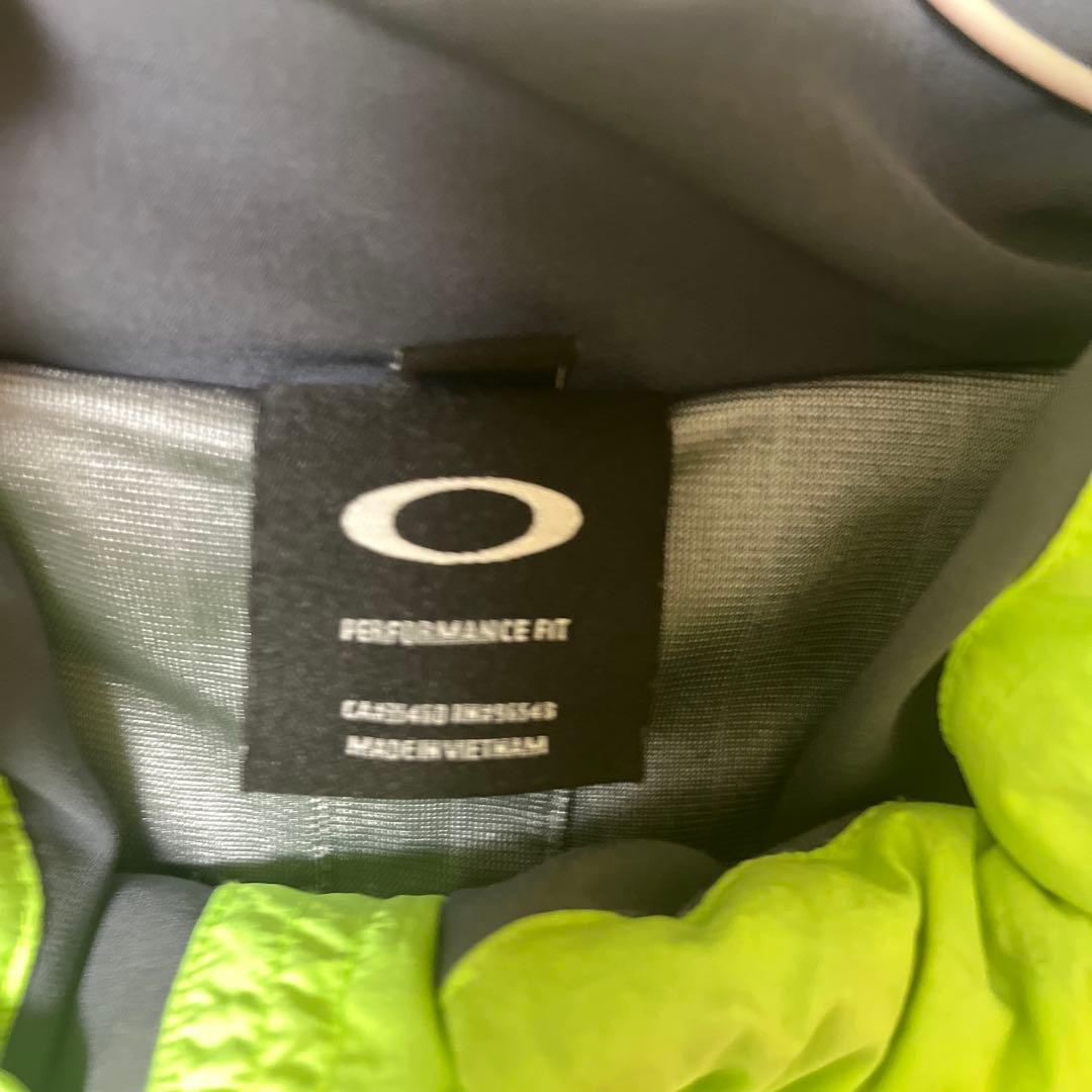 Oakley ライムグリーン ダウンベスト - メルカリ