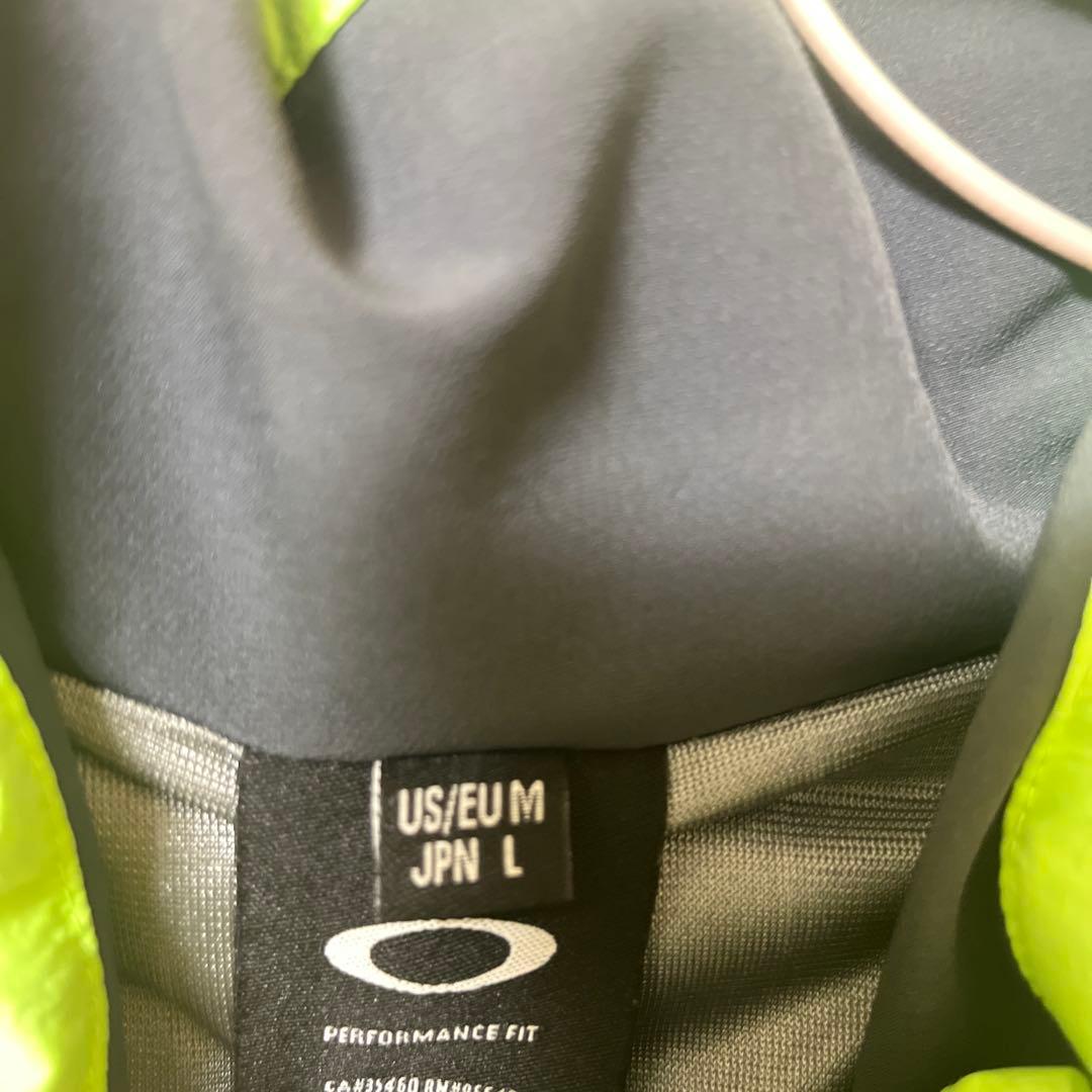 Oakley ライムグリーン ダウンベスト - メルカリ