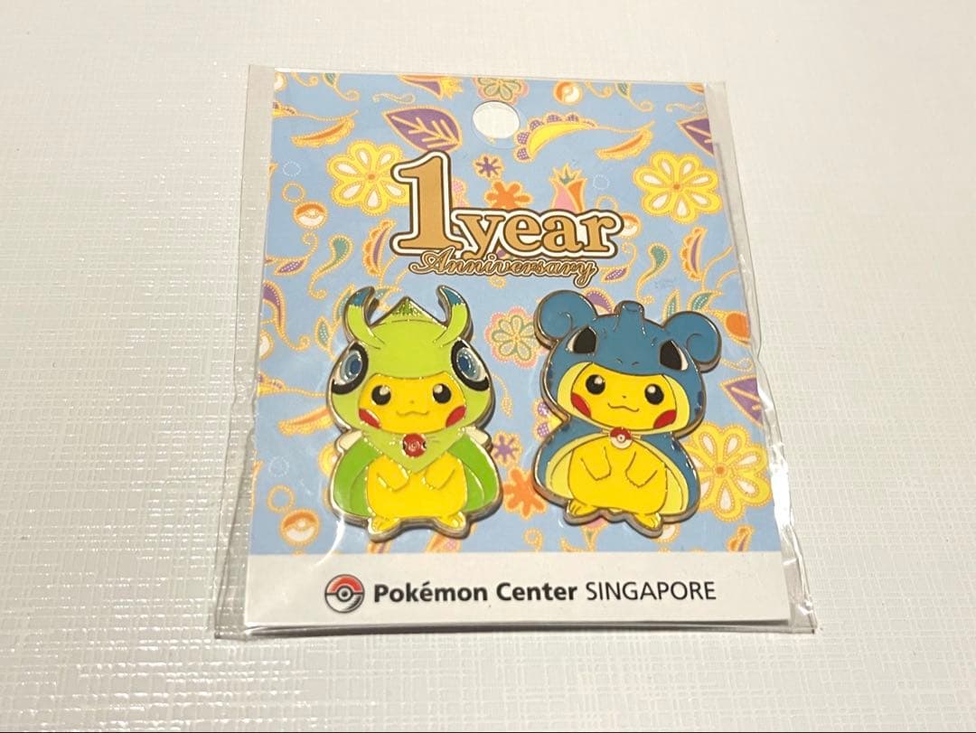 ポケモン シンガポール 1周年ピンズ ポンチョピカチュウ - メルカリ