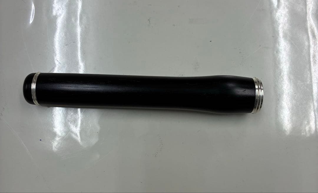 黒い木製ピッコロ用アクセサリー