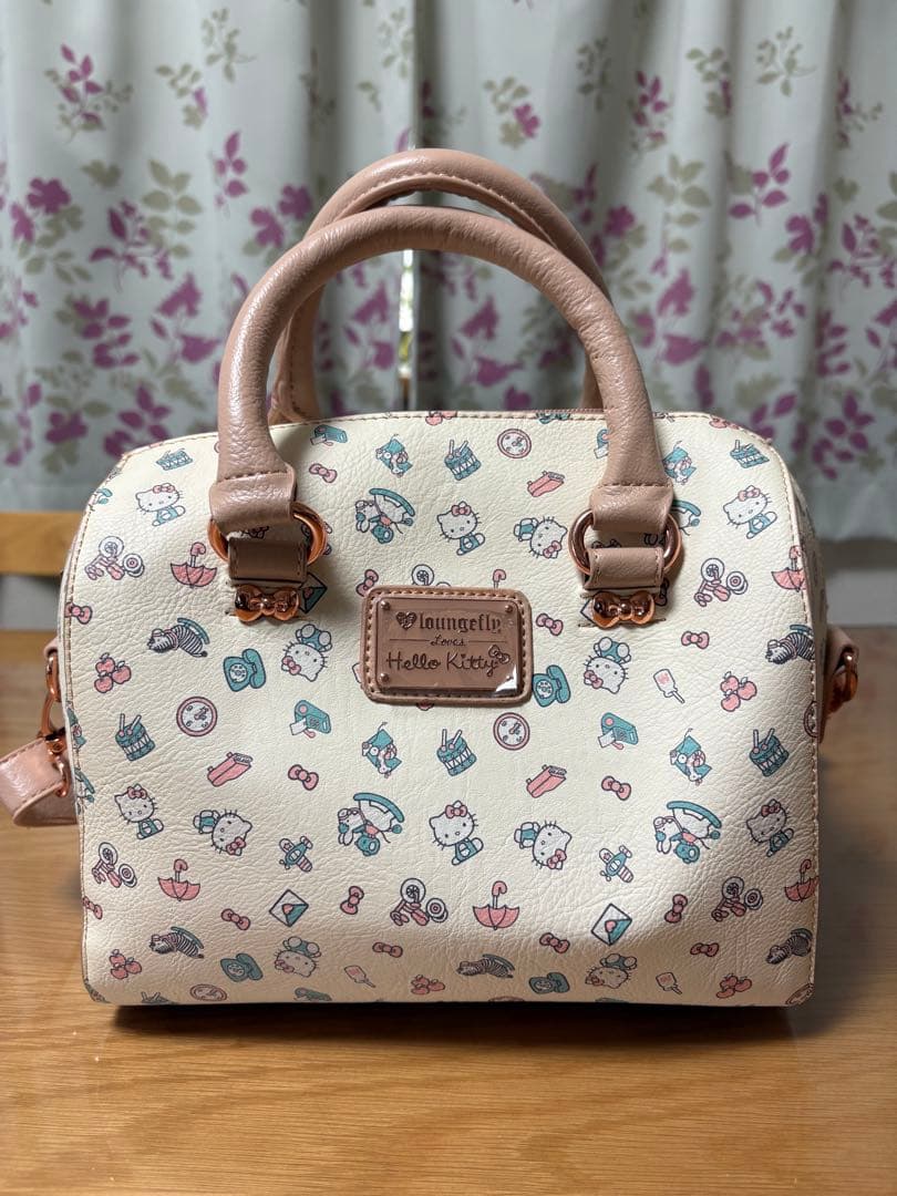 Loungefly Hello Kitty ハンドバッグ(レア商品) Hello Kitty 50th Anniversary Coin Bag Mini-Backpack Loungefly - We