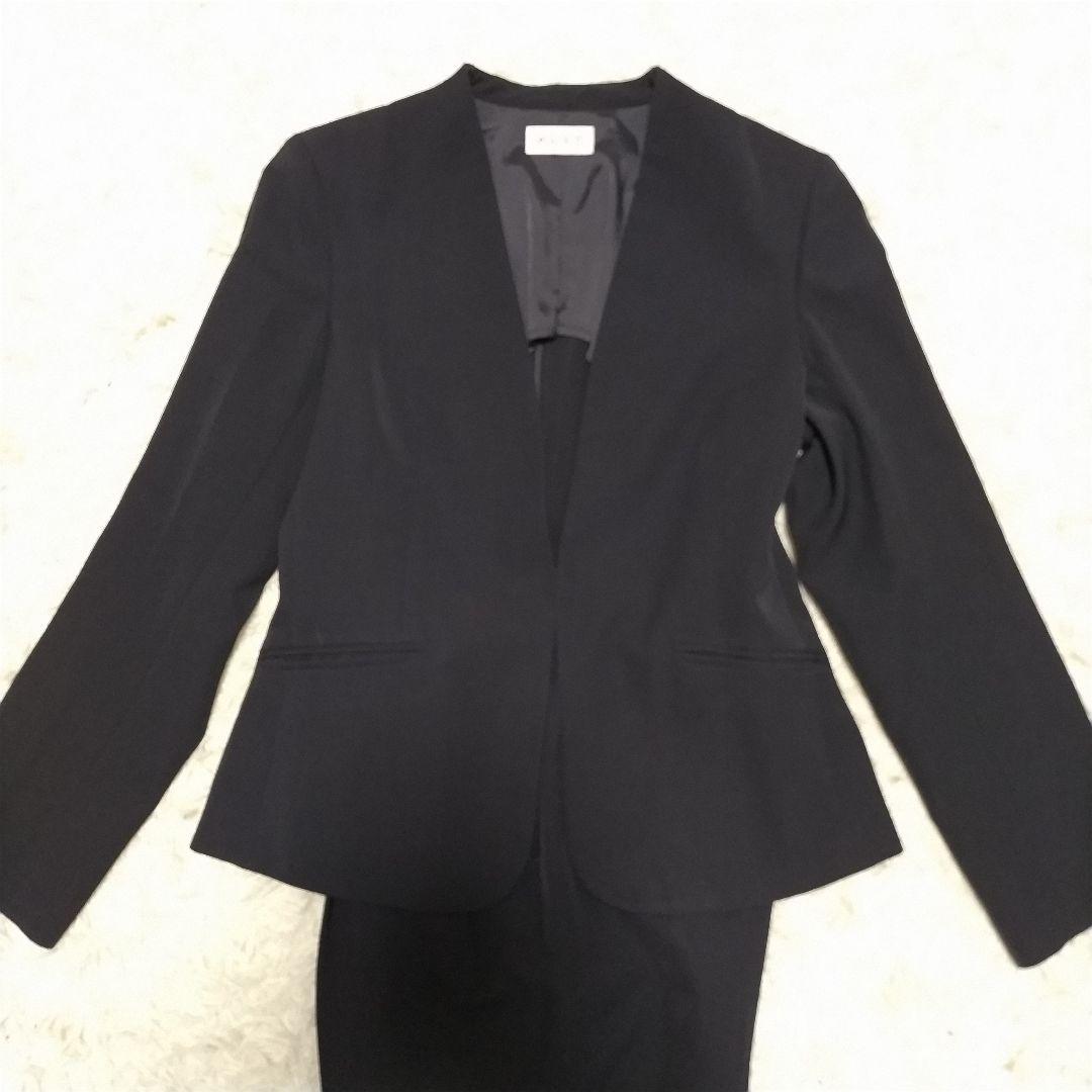 プラステ　パンツスーツ　セットアップ　ノーカラー　カラーレス　ネイビー　背抜き