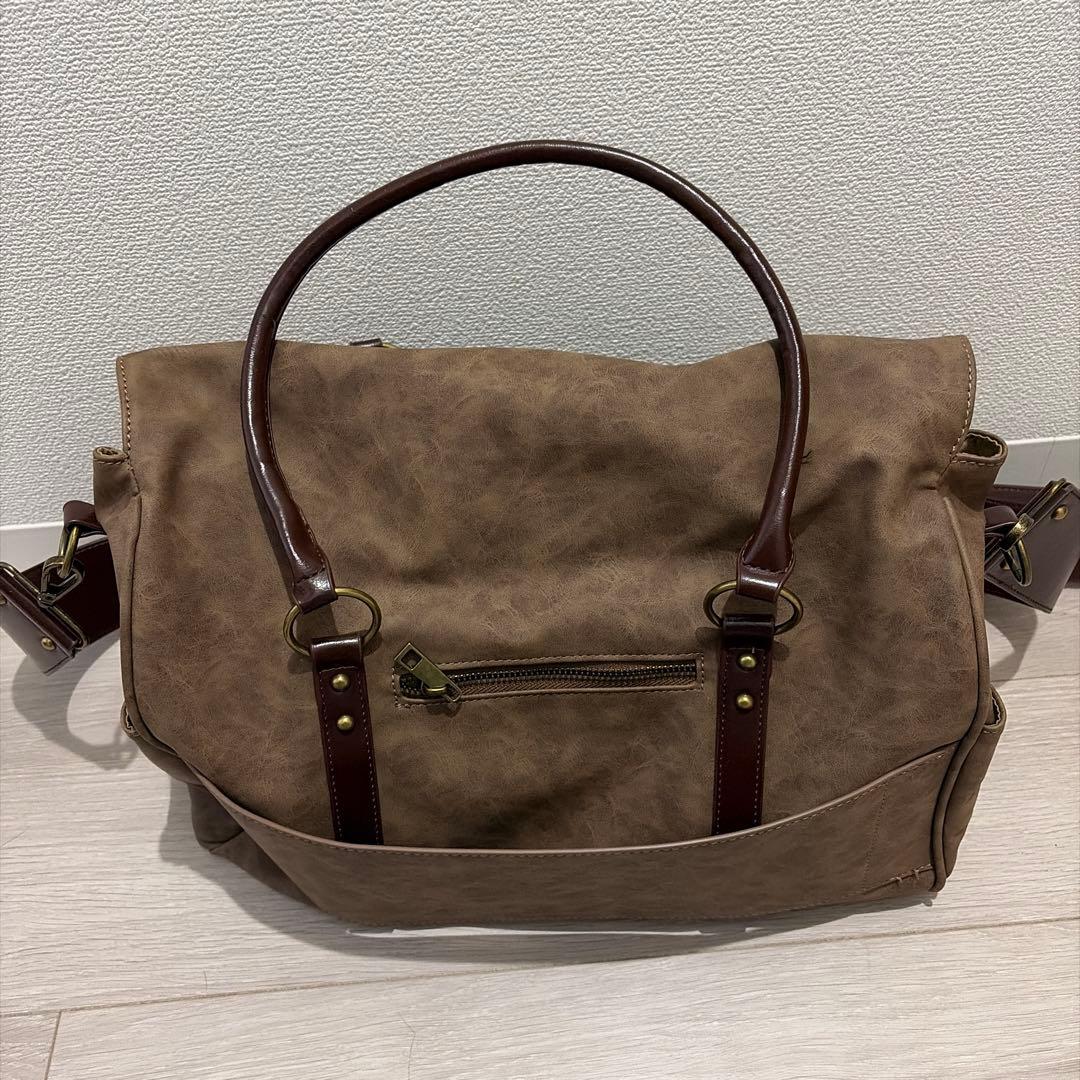 TINA：JOJUN ショルダー付きトラベルバッグ - メルカリ