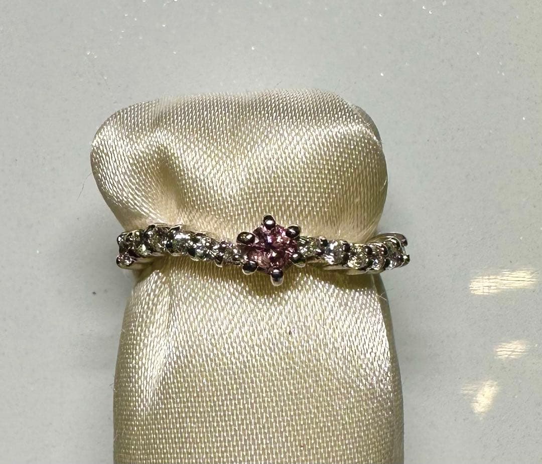 サザエの入れ歯　天然ピンクダイヤ0.103ct.無色ダイヤ0.19ct