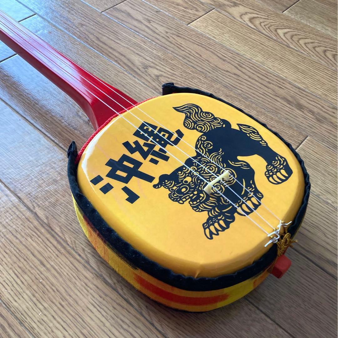 シーサー柄三線（戻らないカラクイ付き）