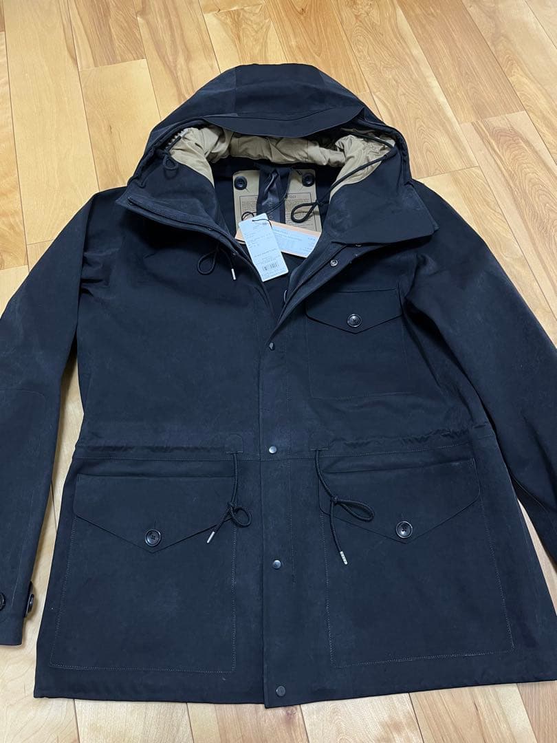 新品未使用187.000円　TenC CARGO PARKA