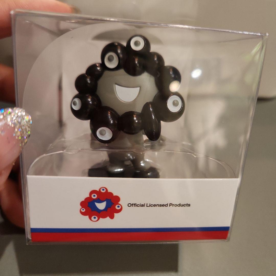 ミャクミャク 首振り人形 首ふり マスコット ブラック 黒 - メルカリ