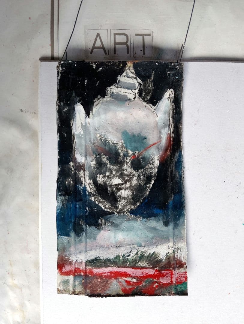 抽象的な顔の油彩画プチンこ