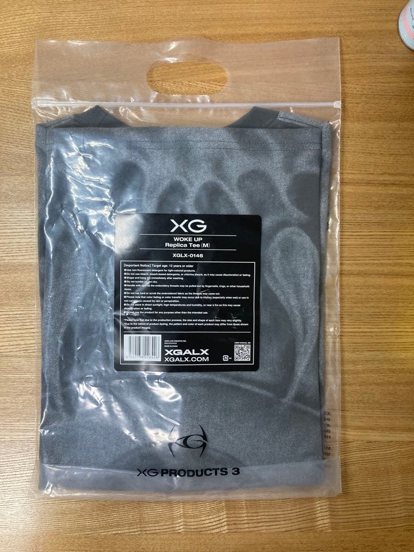 Mサイズ】XG Tシャツ WOKE UP Replica Tee - メルカリ