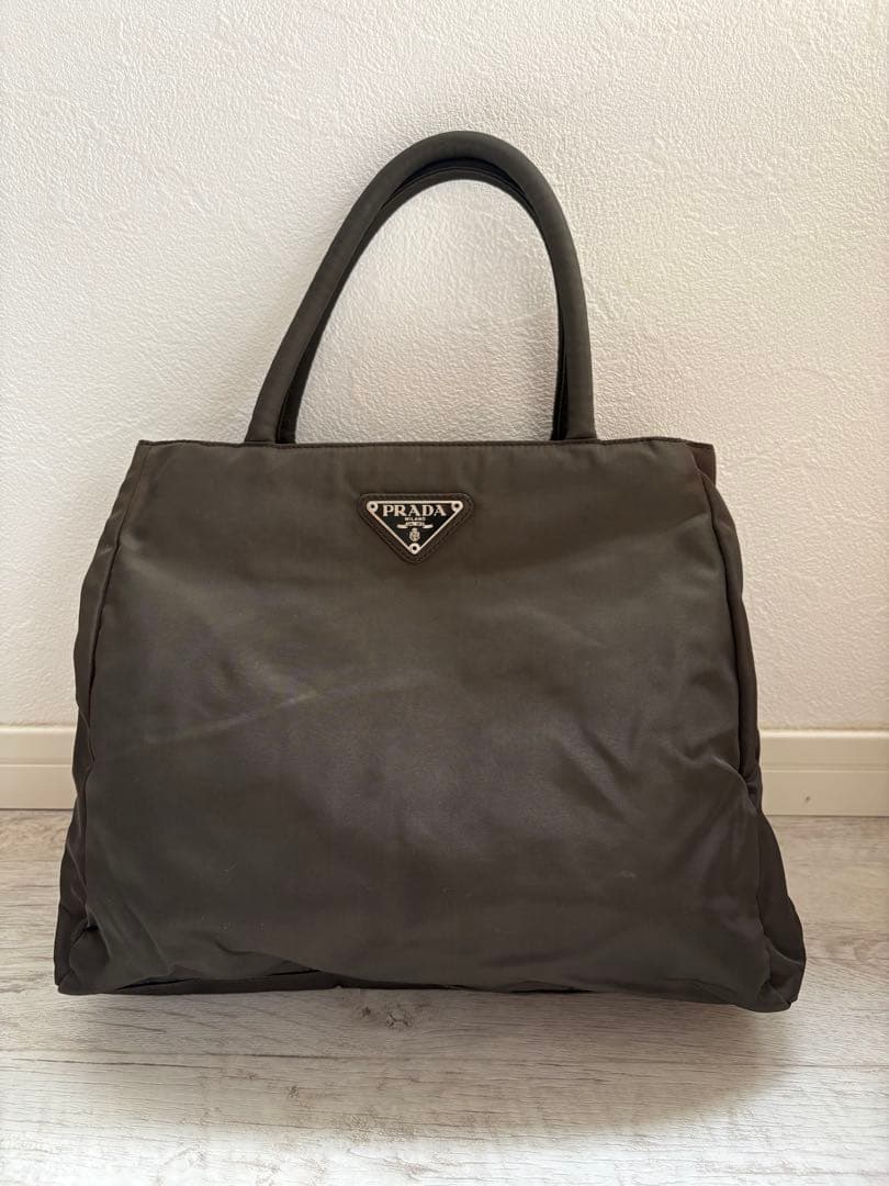 PRADA カーキ　ナイロン　 ハンドバッグ PRADA グリーン系 ナイロン地 ハンドバッグ 色あせ/変色有 】をお売り